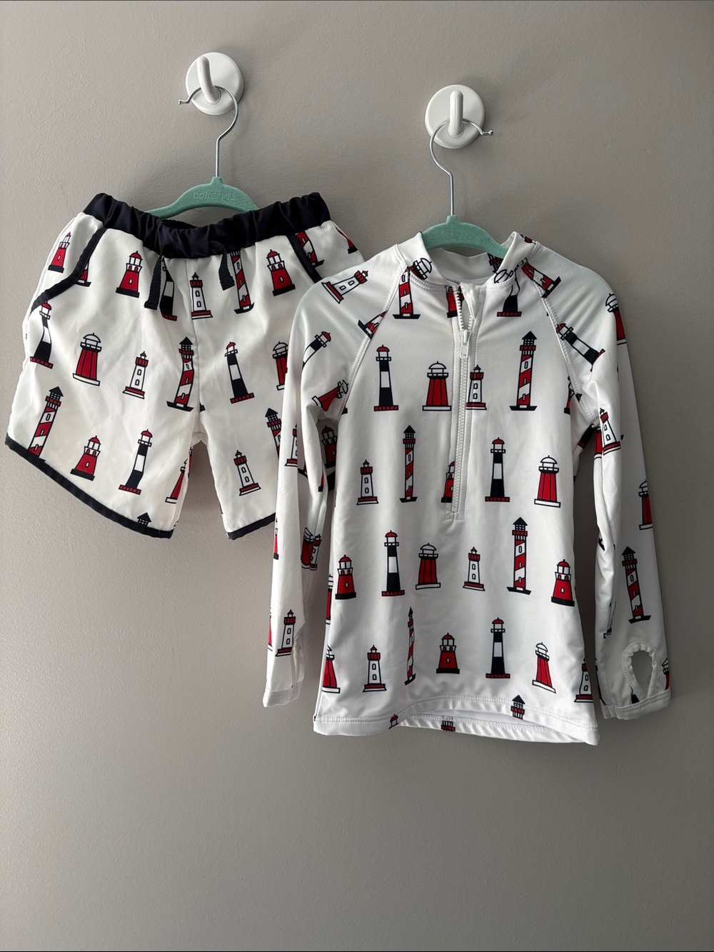 Monica + Andy like new swim trunk/rash guard set
